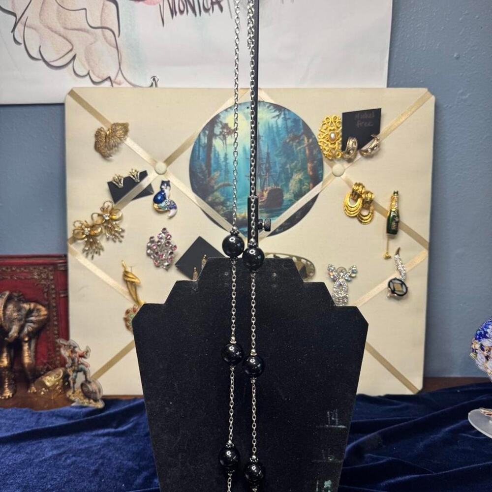 Black beads on silver chain